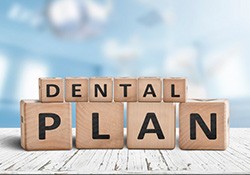 Blocks spell “dental plan”