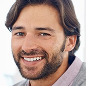 Man with healthy attractive smile and beard