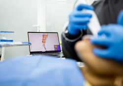 Dentist using an intraoral camera