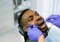 a person having their teeth cleaned