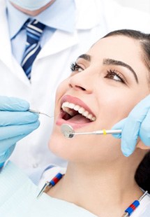 patient getting dental checkup in McGaheysville
            