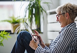 Older woman using a tablet