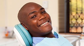 Harrisonburg Dental Services Man in dental chair smiling