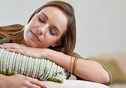 Relaxed woman with eyes closed