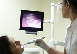 Patient receiving intraoral photos