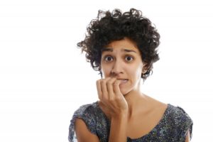 woman biting nails