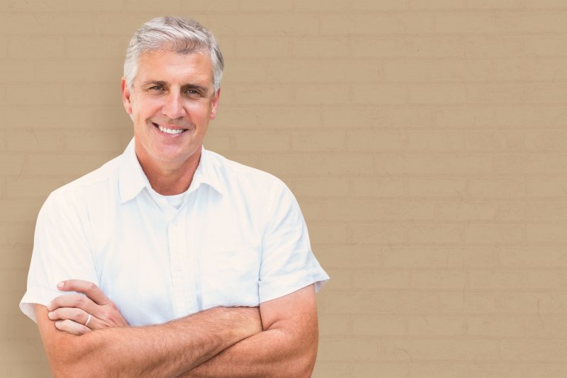 man smiling with dental implants in Harrisonburg