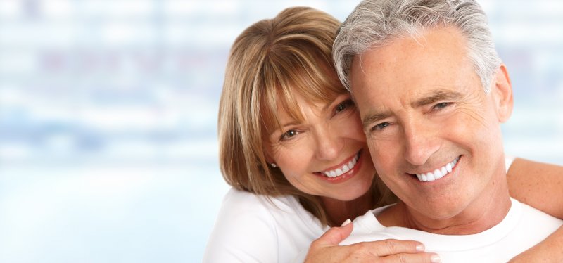 Older couple with white smiles