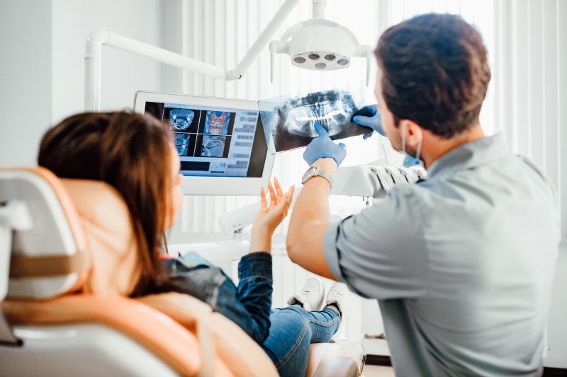 A dentist performing a checkup